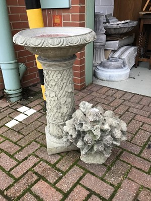 Lot 161 - Concrete garden bird bath, together with an flower head concrete ornament