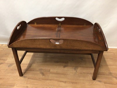 Lot 173 - Campaign style mahogany folding tray topped coffee table