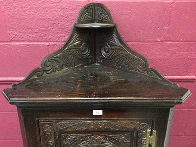 Lot 176 - Victorian mahogany carved oak corner cupboard on stand