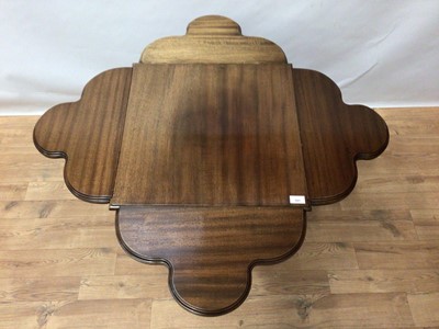 Lot 181 - Regency style mahogany envelope top drop leaf table