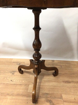 Lot 184 - 19tb century Continental walnut sewing table, together with a 19th century mahogany tripod table