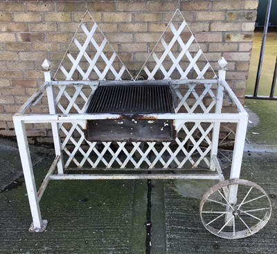 Lot 204 - Bespoke made garden barbecue, white painted with  lattice back and central grill on square section framework with end wheel, 124cm wide x 63cm deep x 123cm high