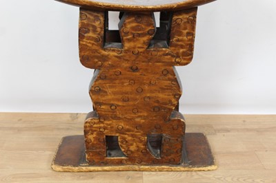 Lot 108 - Antique African Tribal seat with carved stylised turtle supports and dished seat, on rectangular base, 59.5cm wide x 38cm deep x 67cm high