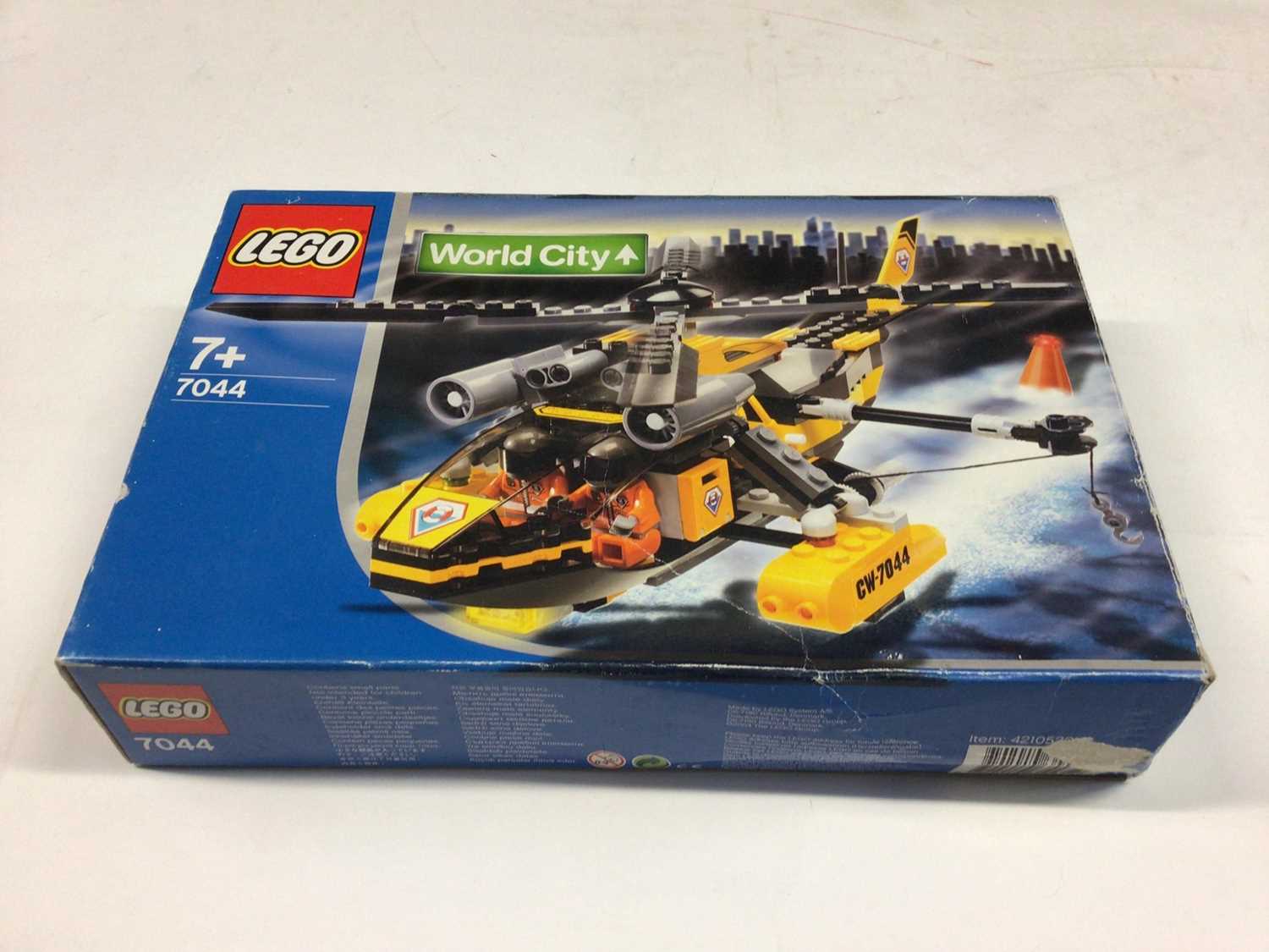 Lot 9 - Lego 7286 Police Bundle, 3180 Tank Truck, 7991 Carbarge Truck, 7044 Coastguard Helicopter, 60042 City Bundle, all including minifigs and instructions, Boxed