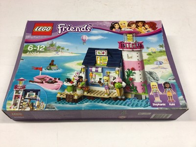 Lot 61 - Lego 41015 Friends (Boat), 41094 Friends (Lighthouse), 41008 Friends (Heartlake City Pool), all with instructions (41094 one book only), Boxed