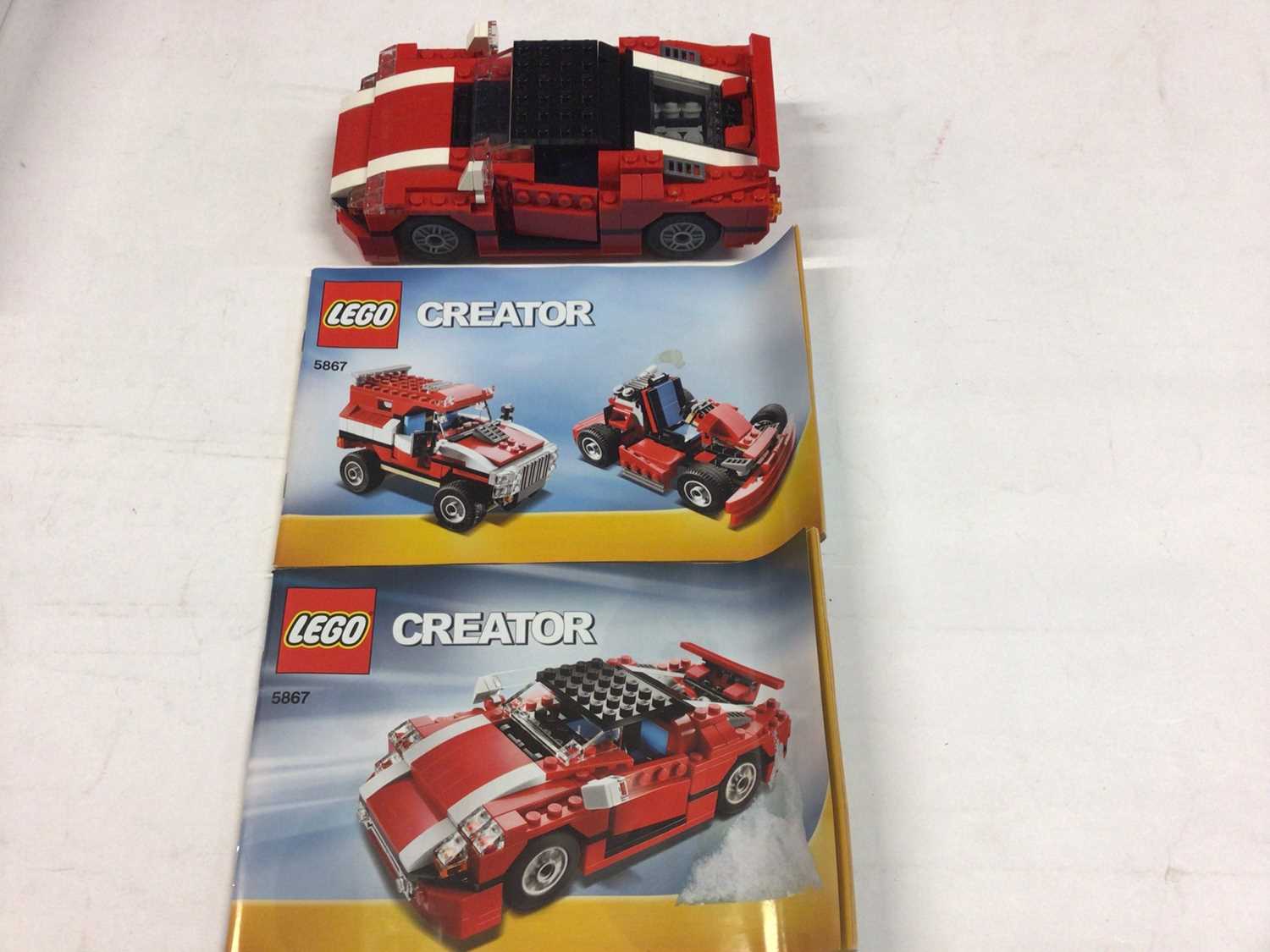 Lot 76 - Lego 5489 Ultimate Building Set, 5867 Super Speedster Car with instructions, 8674 Ferrari F1, 395 Rolls Royce with instructions available on line, no boxes