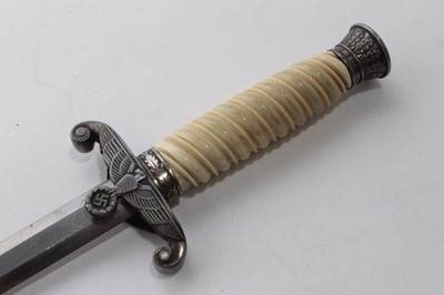Lot 900 - Nazi Wehrmacht 1935 pattern officers' dress dagger with silver plated pommel and crossguard, cream plastic grip, plain blade, by Puma Solingen, also stamped J.G. Merz, in scabbard