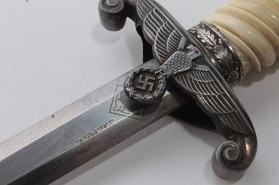 Lot 900 - Nazi Wehrmacht 1935 pattern officers' dress dagger with silver plated pommel and crossguard, cream plastic grip, plain blade, by Puma Solingen, also stamped J.G. Merz, in scabbard