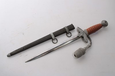 Lot 901 - Nazi 1937 Pattern Luftwaffe Officers' Dress Dagger with polished steel blade by WKC Solingen, Luftwaffe Eagle crossguard, wire bound orange celluloid grip, in scabbard, with silver bullion thread d...