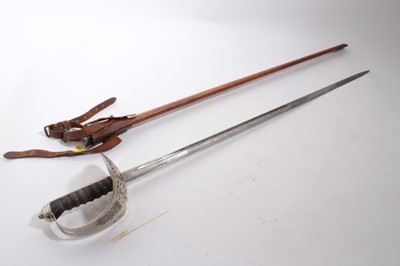 Lot 915 - Elizabeth II 1897 pattern Infantry Officers' sword with wire bound shagreen grip, straight fullered blade by Wilkinson Sword, numbered 76406, etched with Royal Arms, cipher and scrolls, in brown pi...