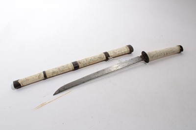 Lot 928 - Japanese Wakizashi in ornately carved bone scabbard with Figural decoration, blade 33cm in length