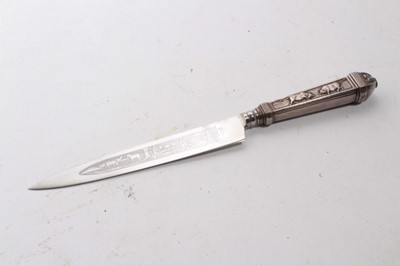 Lot 929 - South American Gaucho Knife / Dagger, etched steel blade by Inox, in silvered scabbard with ornate decoration depicting cattle, 29cm overall