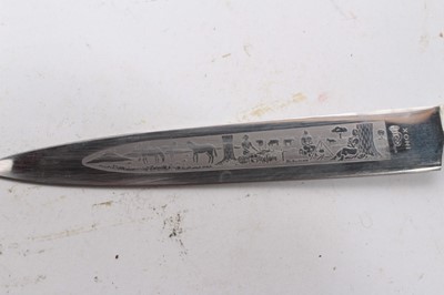 Lot 929 - South American Gaucho Knife / Dagger, etched steel blade by Inox, in silvered scabbard with ornate decoration depicting cattle, 29cm overall