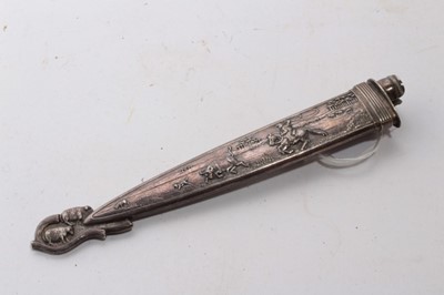 Lot 929 - South American Gaucho Knife / Dagger, etched steel blade by Inox, in silvered scabbard with ornate decoration depicting cattle, 29cm overall