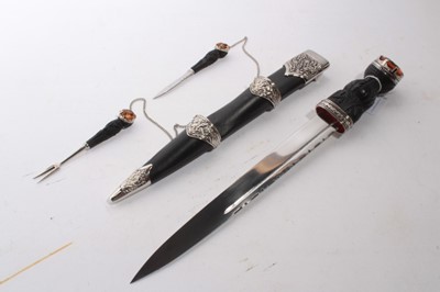 Lot 932 - Replica 19th century-style Scottish Dirk together with two replica Naval Dirks (3)