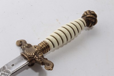 Lot 932 - Replica 19th century-style Scottish Dirk together with two replica Naval Dirks (3)