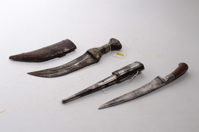 Lot 933 - Arab Jambia dagger in leather sheath, together with an Indo Persian Pesh-Kabz dagger (2)