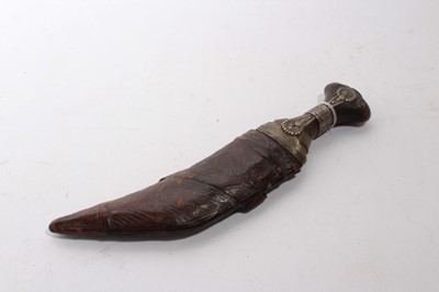 Lot 933 - Arab Jambia dagger in leather sheath, together with an Indo Persian Pesh-Kabz dagger (2)
