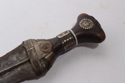 Lot 933 - Arab Jambia dagger in leather sheath, together with an Indo Persian Pesh-Kabz dagger (2)