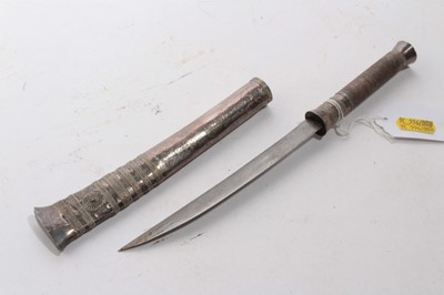 Lot 934 - Burmese Dha Dagger with wire bound white metal grip in similar sheath, together with another similar (2)