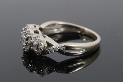 Lot 292 - Diamond triple cluster ring in 18ct white gold setting