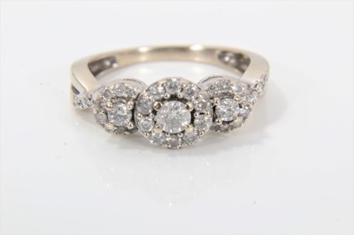 Lot 292 - Diamond triple cluster ring in 18ct white gold setting