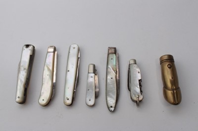 Lot 938 - Three silver and mother of pearl folding fruit knives (various dates and makers) together with two other mother of pearl mounted knives and a brass Vesta case (7)