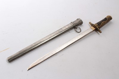 Lot 944 - Second World War period Japanese Police officers dirk with brass cross guard and hilt, wire bound leather grip, with polished steel blade in steel scabbard.