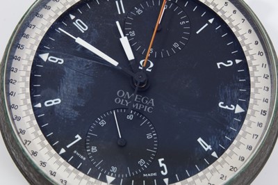 Lot 361 - Rare 1960s Omega Olympic timekeeper's stopwatch with twelve hour dial, subsidiary seconds, minutes and split seconds, in circular case with matte green textured finish. 65mm diameter, with Omega bo...