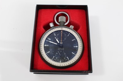 Lot 361 - Rare 1960s Omega Olympic timekeeper's stopwatch with twelve hour dial, subsidiary seconds, minutes and split seconds, in circular case with matte green textured finish. 65mm diameter, with Omega bo...