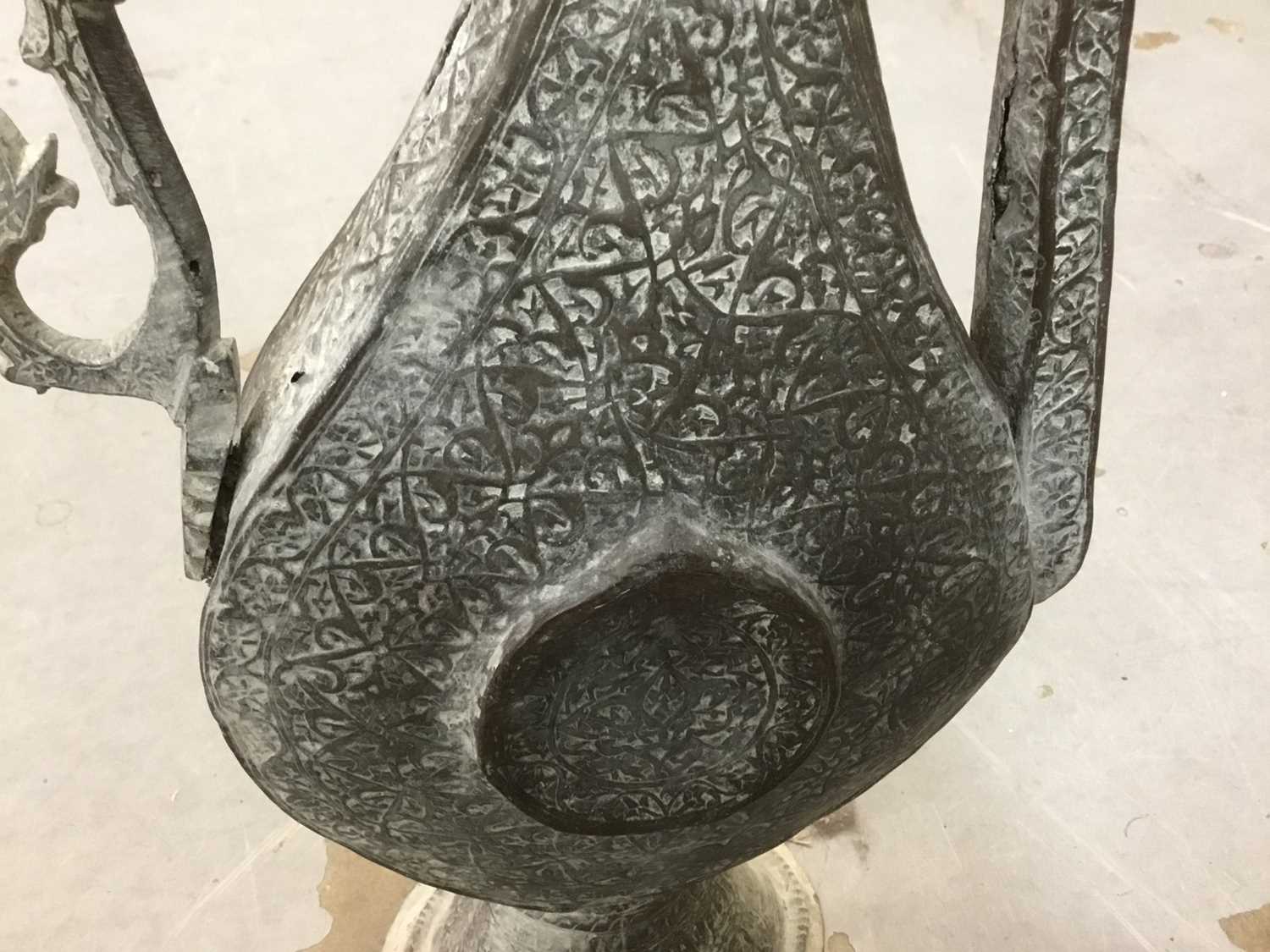 Lot 239 Antique Islamic metalwork ewer