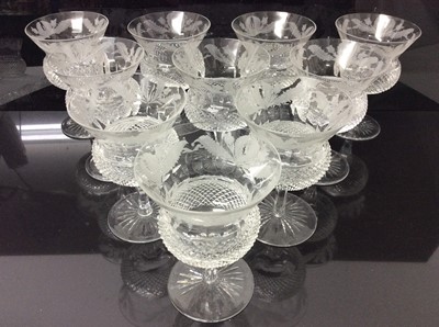 Lot 117 - Edinburgh Crystal cut glass thistle shape table service of glasses