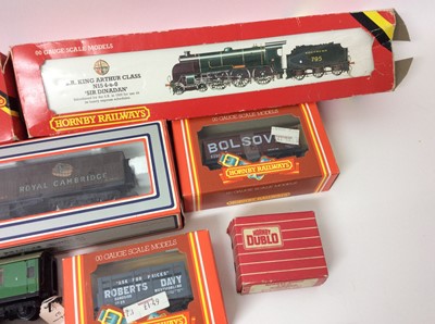 Lot 135 - Railway OO gauge selection including Mallard diorama snow scene, boxed Hornby and Lima carriages and rolling stock, boxed Hornby ‘Sir Dinadan’ locomotive and tender, plus unboxed locomotives and tr...