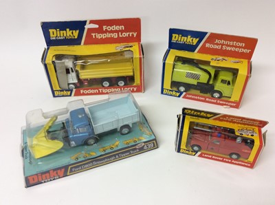 Lot 137 - Dinky Johnston Road Sweeper No. 449, Land Rover Fire Appliance No. 282, Foden Tipping Lorry No. 432, Ford D800 Snowplough and Tipper Truck No. 439, all boxed (4)