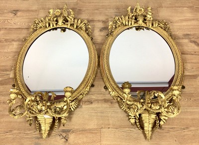 Lot 1487 - Pair of mid Victorian giltwood and gesso girandoles with fern ornament