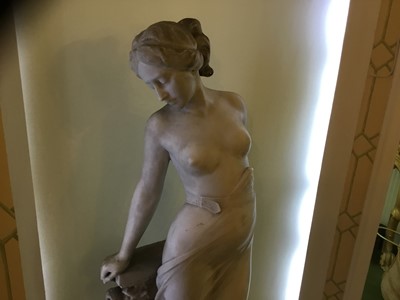 Lot 818 - Antonio Frilli (c1880-1920): Fine late 19th century Italian carved marble sculpture of a scantily clad classical female figure, with balustrade and griffin support 123cm high