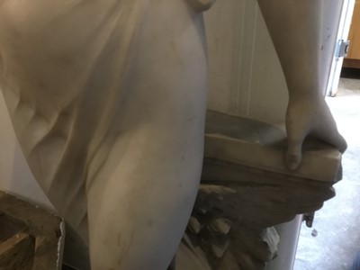 Lot 818 - Antonio Frilli (c1880-1920): Fine late 19th century Italian carved marble sculpture of a scantily clad classical female figure, with balustrade and griffin support 123cm high