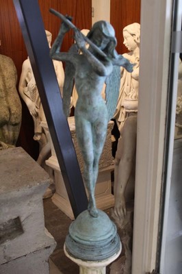 Lot 840 - Bronze figure of a celestial flute player raised on white painted column.