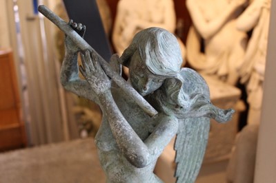 Lot 840 - Bronze figure of a celestial flute player raised on white painted column.