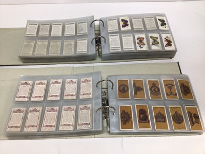 Lot 724 - Cigarette cards selection of sets and part sets in five files including Players Cricketers 1938, Ogdens Sea Adventure, Wills Ships Badges, Military Motors, Fish and Bait, Aviation and others