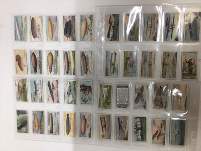Lot 724 - Cigarette cards selection of sets and part sets in five files including Players Cricketers 1938, Ogdens Sea Adventure, Wills Ships Badges, Military Motors, Fish and Bait, Aviation and others