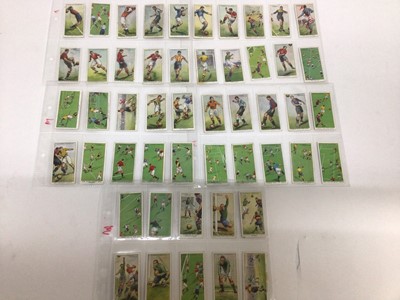 Lot 724 - Cigarette cards selection of sets and part sets in five files including Players Cricketers 1938, Ogdens Sea Adventure, Wills Ships Badges, Military Motors, Fish and Bait, Aviation and others