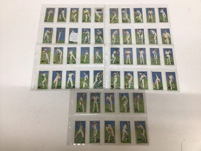 Lot 724 - Cigarette cards selection of sets and part sets in five files including Players Cricketers 1938, Ogdens Sea Adventure, Wills Ships Badges, Military Motors, Fish and Bait, Aviation and others