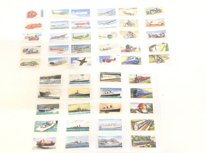 Lot 729 - Cigarette cards selection of sets and part sets in five files including Lambert and Butler Motor Cycles, Motor Cars, Interesting Sidelights on the Work of the G.P.O, Wills Capston Arms and Armour,...