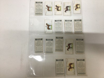 Lot 731 - Cigarette cards selection of sets and part sets in five files including Churchmans Boxing Personalities, Can You Beat Bogey at St Andrews, Players Derby and Grand National Winners, Types of Horses...