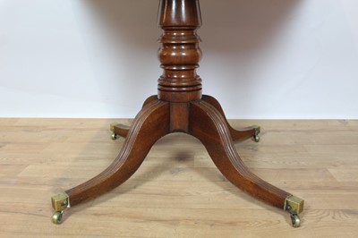 Lot 733 - Georgian mahogany pedestal breakfast table with rounded rectangular top