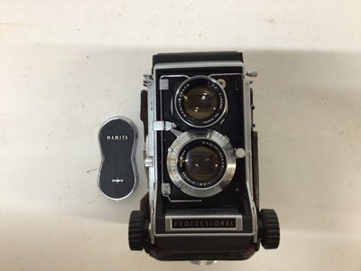 Lot 255 - Three roll film TLRs, two Yashicamats and a Mamiya C33 fitted with 80 mm F 2.8 lenses