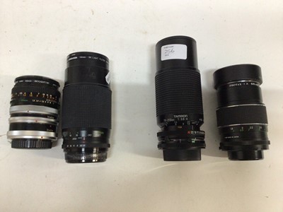 Lot 256 - Quantity of interchangeable lenses for 35 mm SLR cameras including Zeus, Minolta, Konica, Tamron, Olympus and others