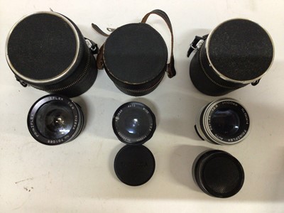 Lot 256 - Quantity of interchangeable lenses for 35 mm SLR cameras including Zeus, Minolta, Konica, Tamron, Olympus and others