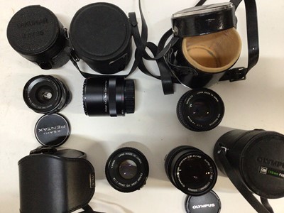 Lot 256 - Quantity of interchangeable lenses for 35 mm SLR cameras including Zeus, Minolta, Konica, Tamron, Olympus and others